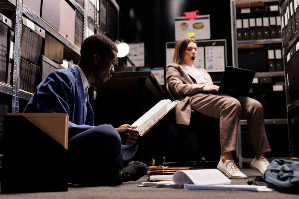 Bookkeeper analyzing bureaucracy files