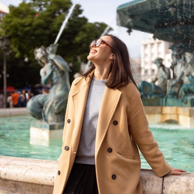 Female tourist enjoying in Lisbon downtown