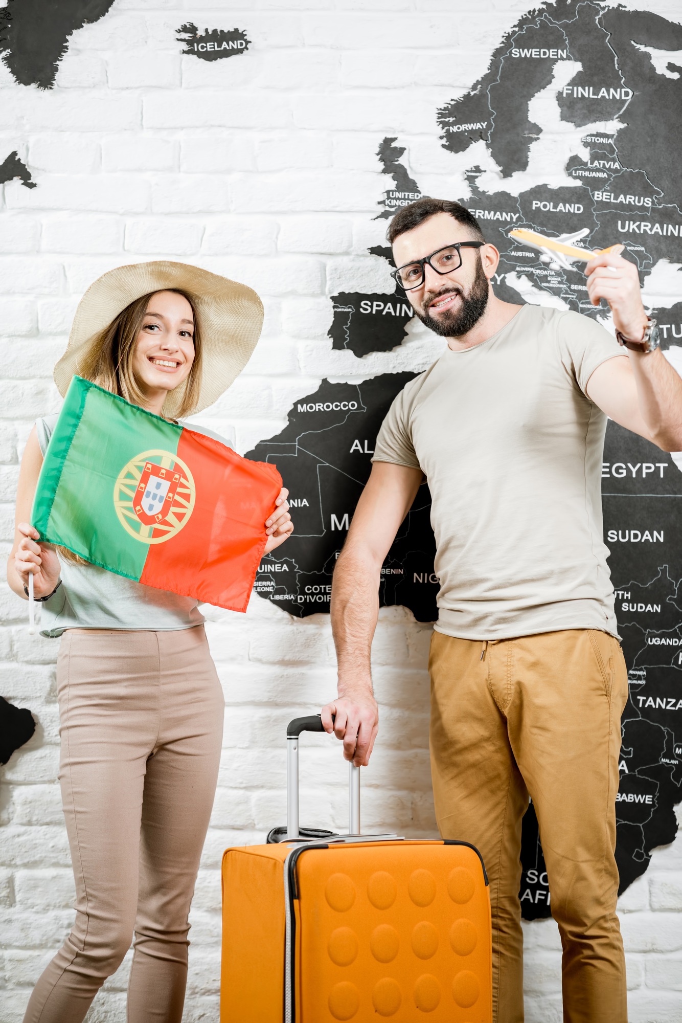 Young couple dreaming about a trip to Portugal